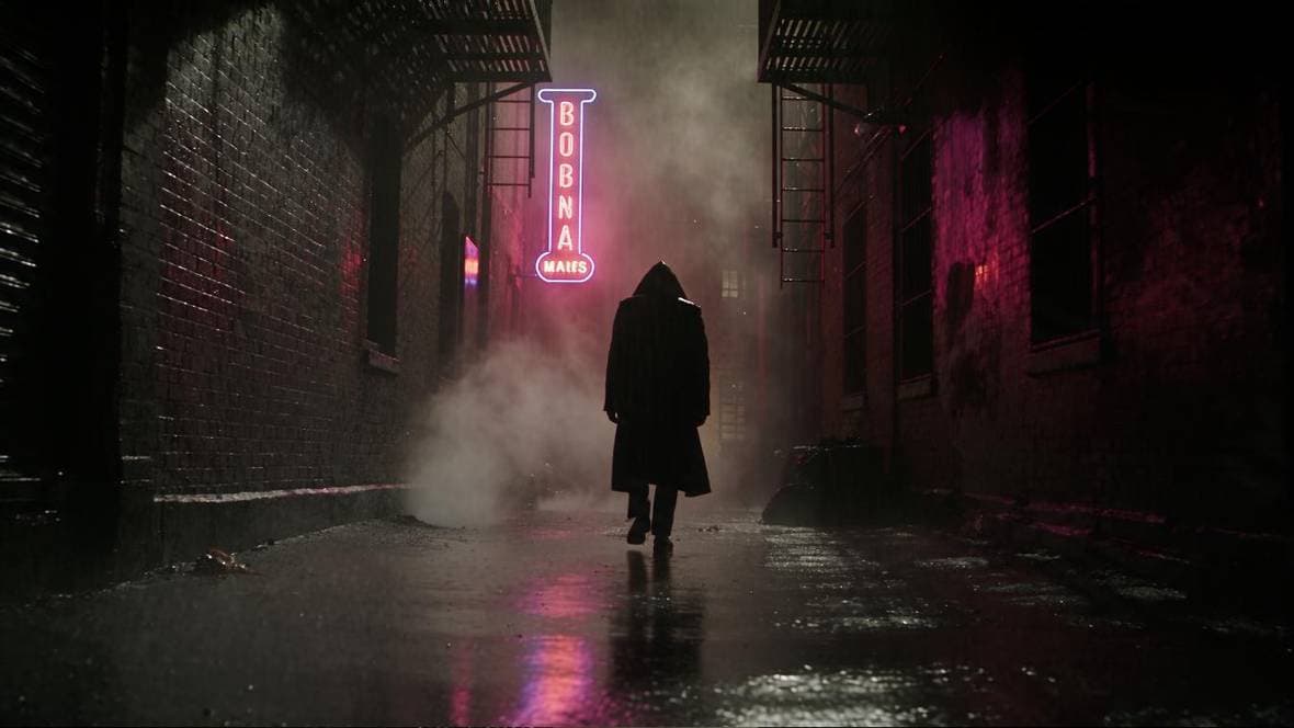 A frame from a five-second 1080p clip of a rain-wet night street, generated in Omnibo